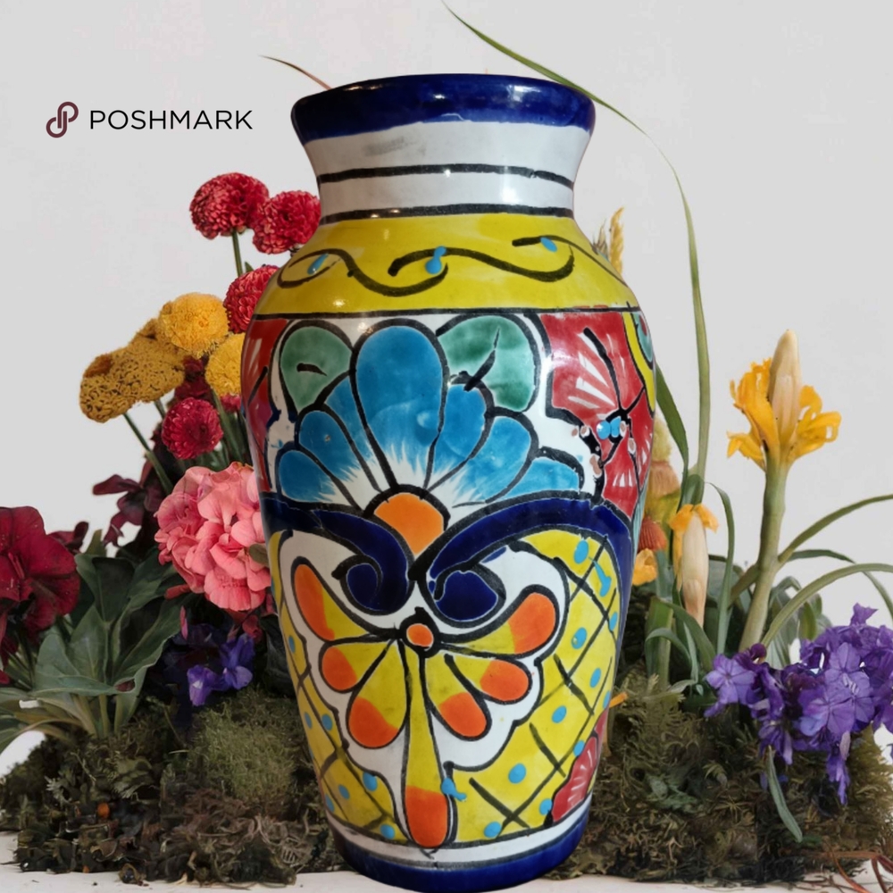 Blue and Yellow Ceramic Art with Whimsical Floral Patterns
